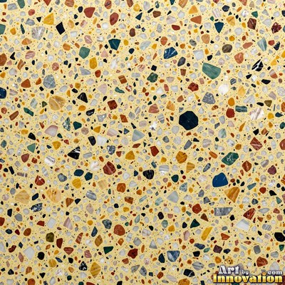 Polished terrazzo with small stone chips scattered evenly across a charcoal base