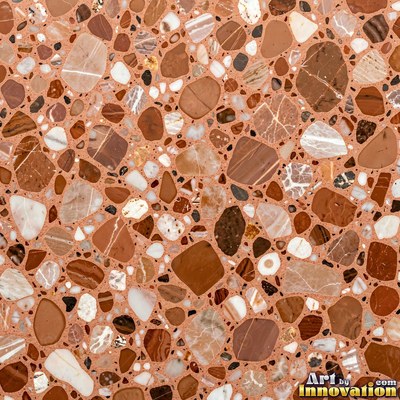 Polished terrazzo with small stone chips scattered evenly across a charcoal base