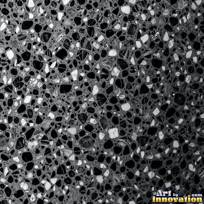 Polished terrazzo with small stone chips scattered evenly across a charcoal base