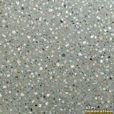 Minimal terrazzo with sparse chips on a smooth warm yellow base