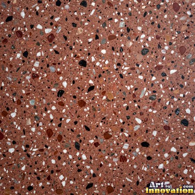 Cream and sand terrazzo set with large irregular stone fragments