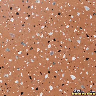 Polished terrazzo with small stone chips scattered evenly across a charcoal base