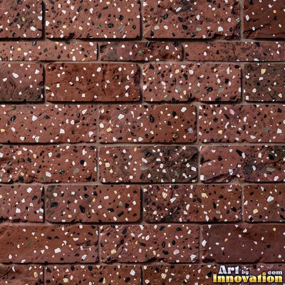 Black and white terrazzo flecked with mother of pearl, evenly lit
