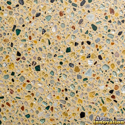 Cream and sand terrazzo set with large irregular stone fragments