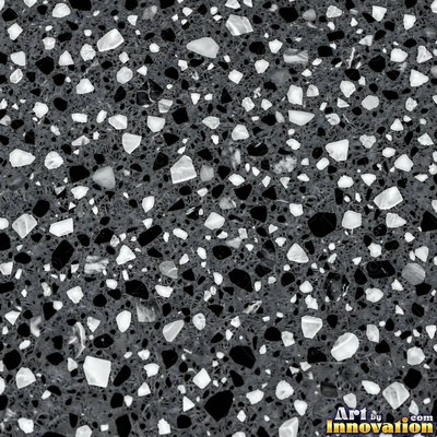 Minimal terrazzo with sparse chips on a smooth warm yellow base