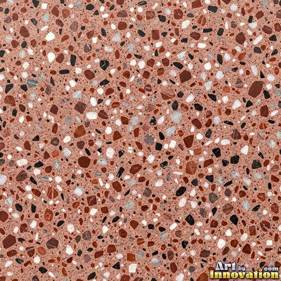 Minimal terrazzo with sparse chips on a smooth warm yellow base