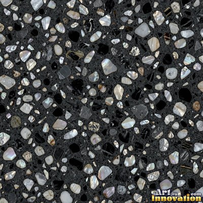 Minimal terrazzo with sparse chips on a smooth warm yellow base