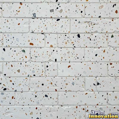 Cream and sand terrazzo set with large irregular stone fragments