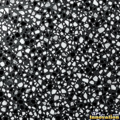 Cream and sand terrazzo set with large irregular stone fragments