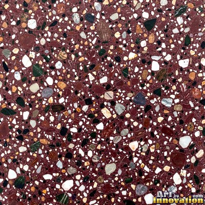Minimal terrazzo with sparse chips on a smooth warm yellow base
