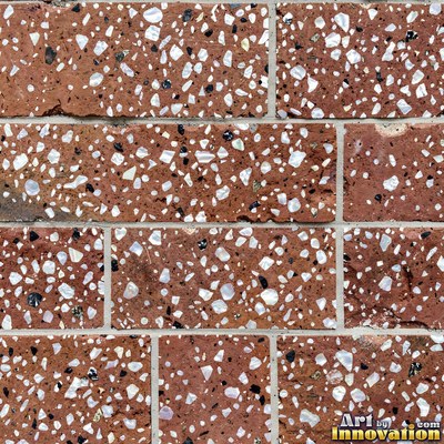 Cream and sand terrazzo set with large irregular stone fragments