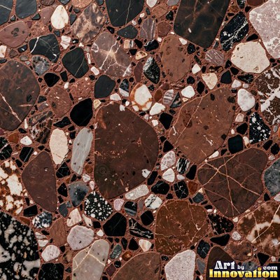 Minimal terrazzo with sparse chips on a smooth warm yellow base
