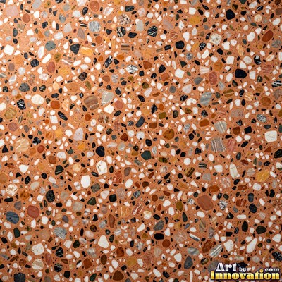Cream and sand terrazzo set with large irregular stone fragments