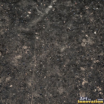 Worn asphalt with faded fragments of painted road lines