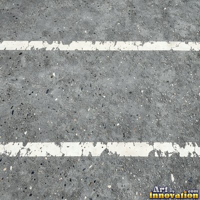Worn asphalt with faded fragments of painted road lines