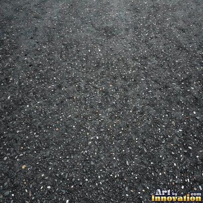 Wet asphalt glistening with small puddles in a greenish gray tone