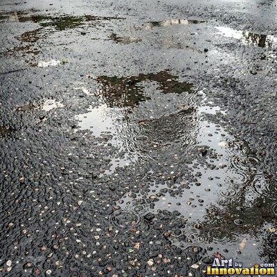 Fresh light gray asphalt with fine gravel texture, flat overhead view
