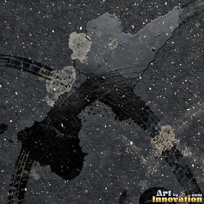 Asphalt pavement marked with oil stains and tire scuffs in medium gray