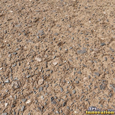 Worn asphalt with faded fragments of painted road lines