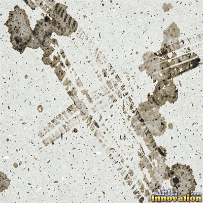 Worn asphalt with faded fragments of painted road lines