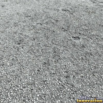 Fresh light gray asphalt with fine gravel texture, flat overhead view