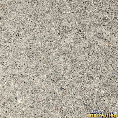 Worn asphalt with faded fragments of painted road lines