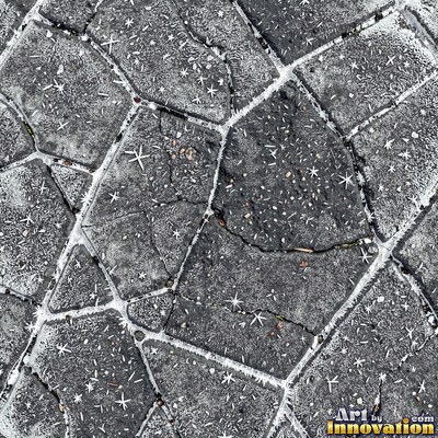 Asphalt pavement marked with oil stains and tire scuffs in medium gray
