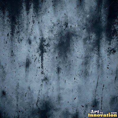Blackened grunge wall with dried paint splatter filling the frame