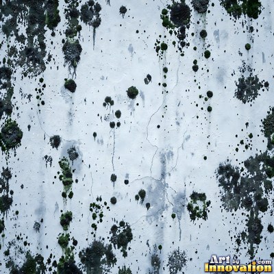 Grungy beige wall splattered with old paint drips, shot flat and even