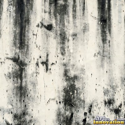 Smoke stained ochre wall with dark soot gradients across the surface