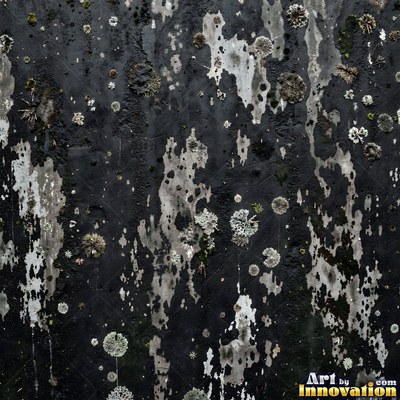 Blackened grunge wall with dried paint splatter filling the frame