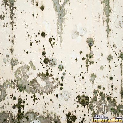 Old blue gray wall built up in layers of patched plaster and paint