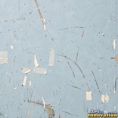 Old blue gray wall built up in layers of patched plaster and paint