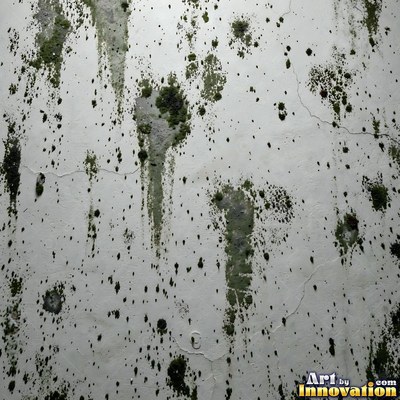 Old blue gray wall built up in layers of patched plaster and paint