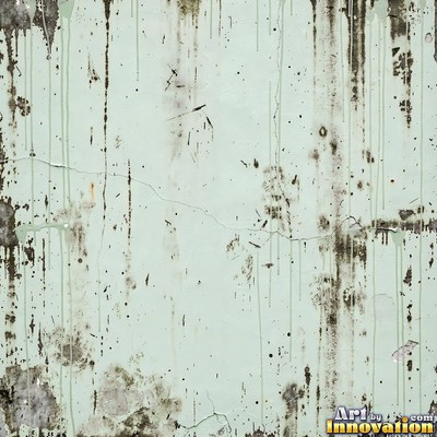 Grungy beige wall splattered with old paint drips, shot flat and even