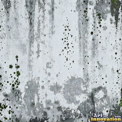 Grungy beige wall splattered with old paint drips, shot flat and even