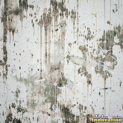 Smoke stained ochre wall with dark soot gradients across the surface