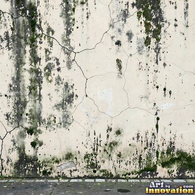 Old blue gray wall built up in layers of patched plaster and paint