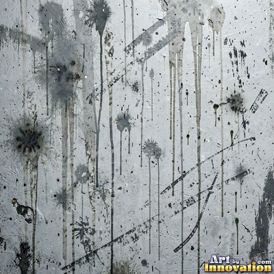 Blackened grunge wall with dried paint splatter filling the frame