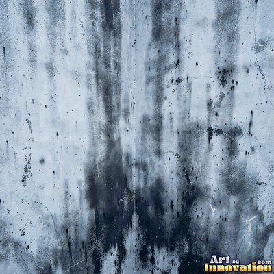 Old blue gray wall built up in layers of patched plaster and paint
