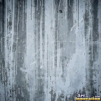 Grungy beige wall splattered with old paint drips, shot flat and even