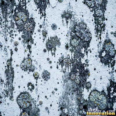 Blackened grunge wall with dried paint splatter filling the frame