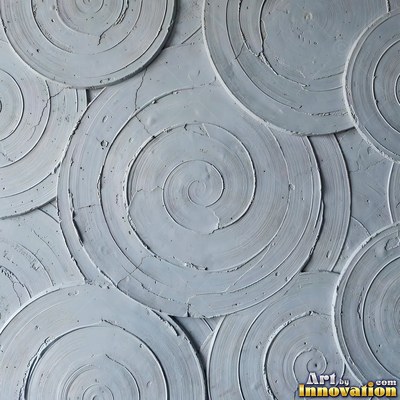 Swirled plaster ceiling pattern of overlapping circles in cool gray