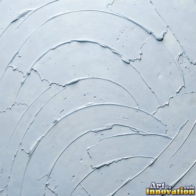 Swirled plaster ceiling pattern of overlapping circles in cool gray
