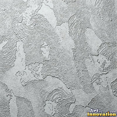 Rough sand textured stucco in warm beige under even front light