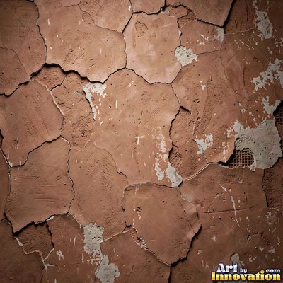 Rough sand textured stucco in warm beige under even front light