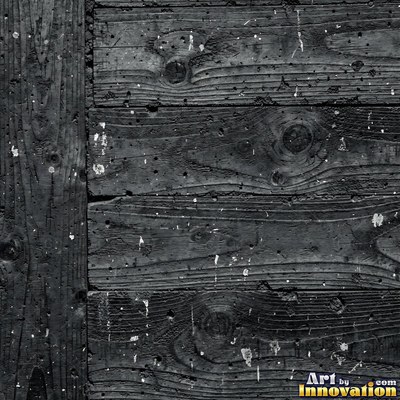 Smooth raw concrete with small air holes scattered across the surface