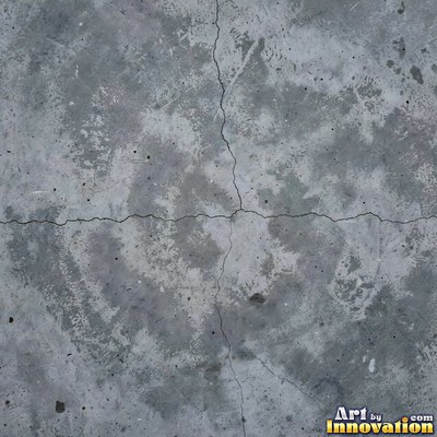 Smooth raw concrete with small air holes scattered across the surface