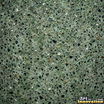 Smooth raw concrete with small air holes scattered across the surface