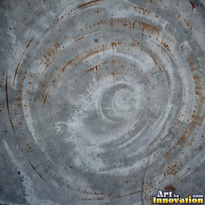 Acid washed concrete with mottled light and dark gray staining
